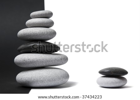 Similar – Image, Stock Photo A nice peeble with a harsh sun shadow on a gray backdrop