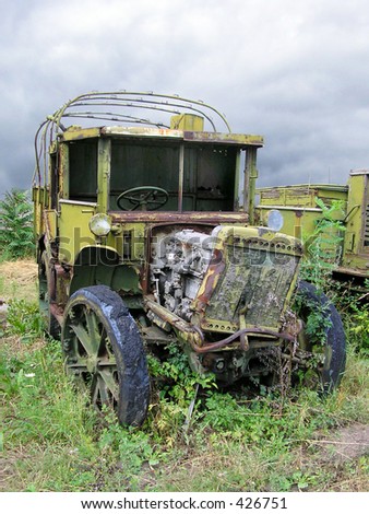 Old Ruined Russian Military Truck From WWII, Weeds, Dramatic Sky