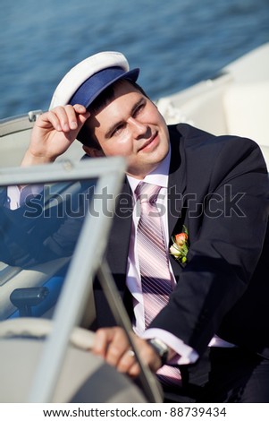 portrait of a Captain managing the yacht