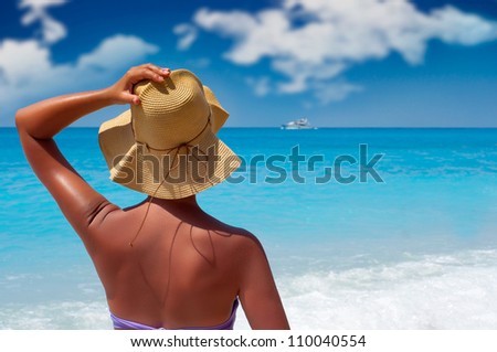 Woman looking at boat