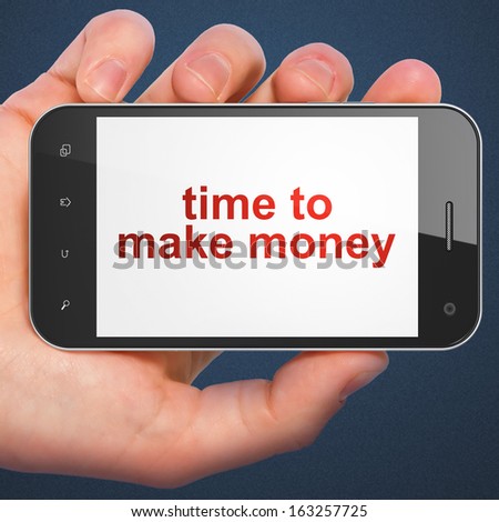Timeline concept: hand holding smartphone with word Time to Make money on display. Mobile smart phone on Blue background, 3d render