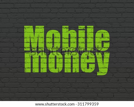 Money concept: Painted green text Mobile Money on Black Brick wall background