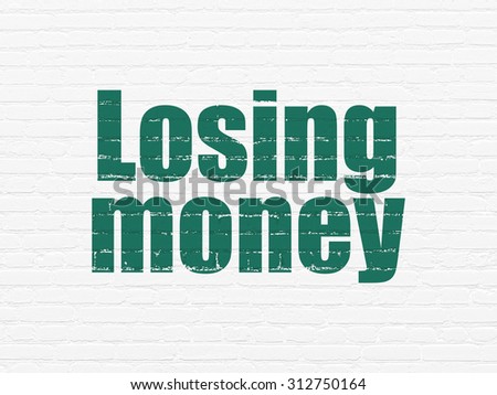 Currency concept: Painted green text Losing Money on White Brick wall background