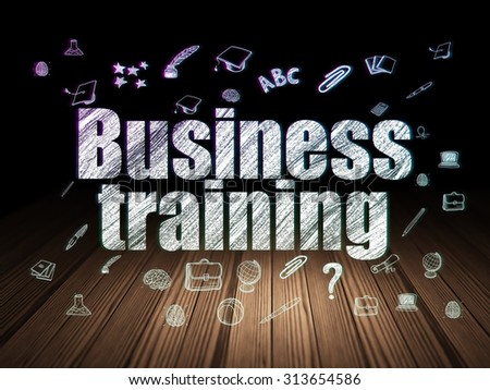 Education concept: Glowing text Business Training,  Hand Drawn Education Icons in grunge dark room with Wooden Floor, black background