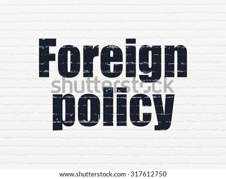 Political concept: Painted black text Foreign Policy on White Brick wall background
