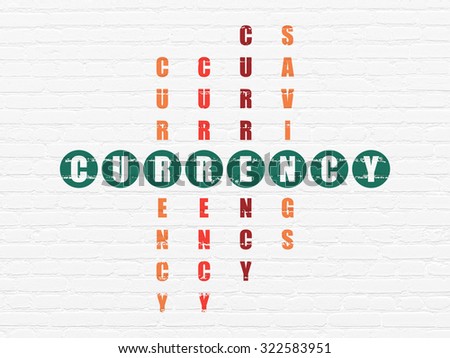Currency concept: Painted green word Currency in solving Crossword Puzzle