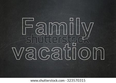 Tourism concept: text Family Vacation on Black chalkboard background