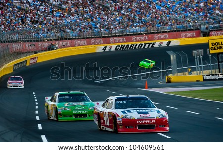 CHARLOTTE, NC - MAY 27:   Jimmie Johnson leads Kasey Kahne at the Nascar Coca Cola 600  at Charlotte Motorspeedway in Charlotte, NC on May 27, 2012