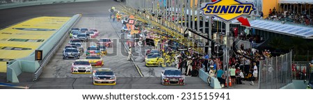 MIAMI, FL - Nov 16: Pit stops at the Nascar Sprint Cup Ford Ecoboost 400 race at Homestead-Miami Raceway in Homestead, FL on November 16, 2014
