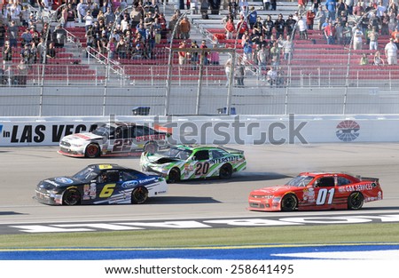 LAS VEGAS, NV - March 07: Erik Jones wrecks his car (20) at the NASCAR Boyd Gaming 300 Xfinity race at Las Vegas Motor Speedway in Las Vegas, NV on March 07, 2015