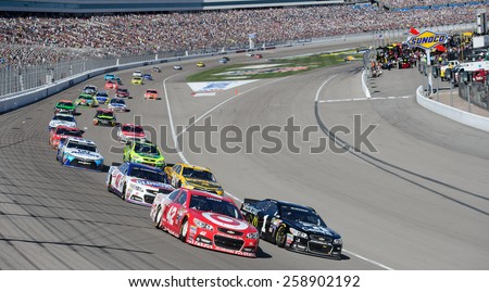LAS VEGAS, NV - March 08: Kyle Larson (42) and Jamie McMurray (1) lead the field at the NASCAR Sprint Kobalt 400 race at Las Vegas Motor Speedway on March 08, 2015