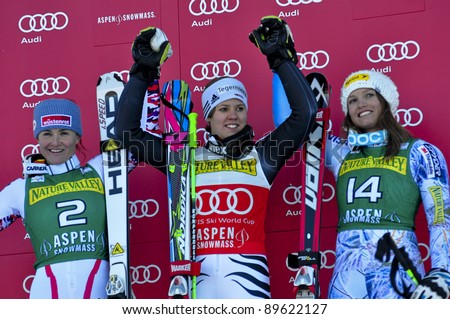ASPEN, CO - NOV 26: The podium, left to right, 2nd  Elisabeth Goergl, winner Viktoria Rebensburg and 3rd  Julia Mancuso at the Audi Quattro FIS Women Giant Slalom Worldcup in Aspen, CO on Nov 26, 2011