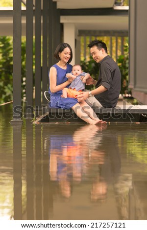 Young Asian Chinese family with 5 month old son