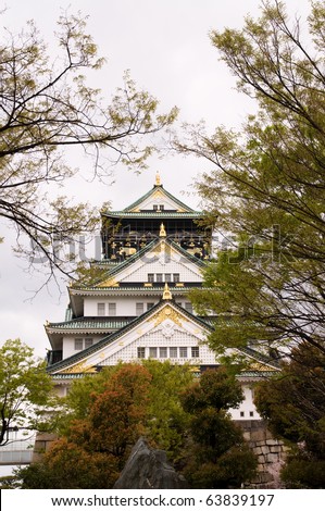 Ancient medieval castle during cherry blossom sakura spring season in Osaka, Japan