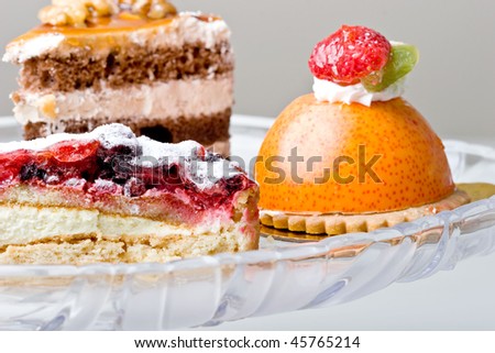 Delicious gourmet sweet treats desserts cream mousse cake on a plate