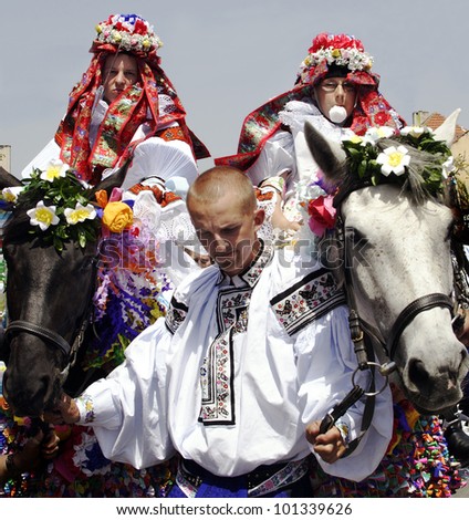 VLCNOV, CZECH REPUBLIC Ã¢Â?Â? MAY 27, 2007 - Radim Podskubka (on the right) with his company rides on horse as king of Ride of the kings on May 27, 2007, Vlcnov. Celebration is on UNESCO list.
