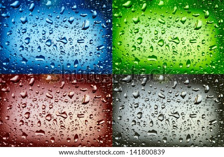 Water drops on green, blue, black and red background