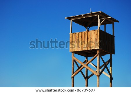 Wooden stand against blue sky