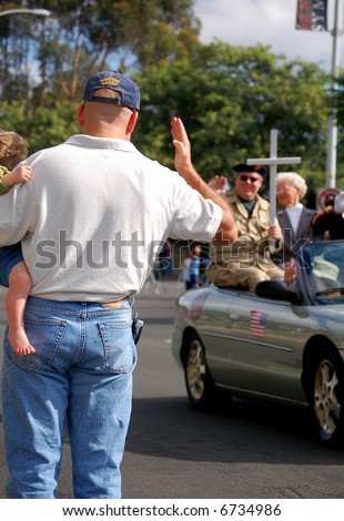 Military Veterans Being Saluted in Parade
