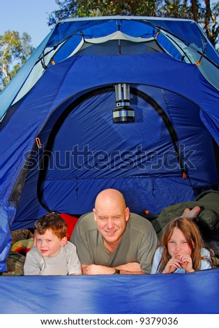 Family camping outdoors