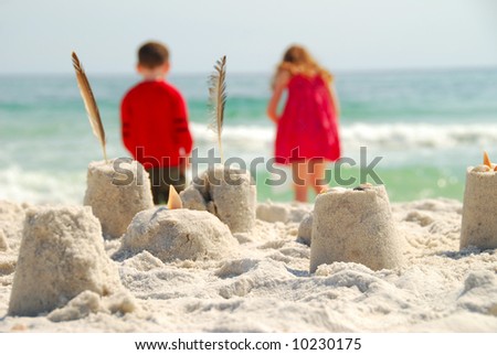 Brother and Sister at the Beach, Building Sand Castles