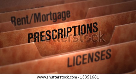 Filing cabinet for receipts with Prescriptions Tab prominent