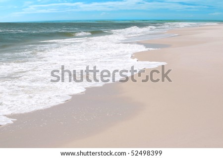 Waves on beach on pretty gulf coast