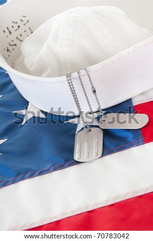 hat and dog tags from sailor