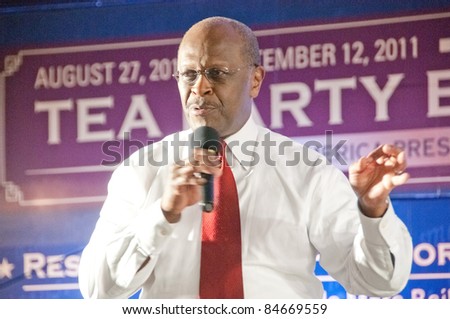 TAMPA - SEPTEMBER 12: Republican candidate Herman Cain addresses supporters after the CNN/Tea Party Express debate in Tampa, Florida on September 12, 2011.