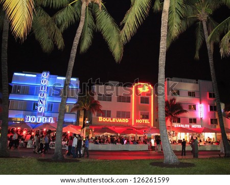 MIAMI BEACH - DECEMBER 29: Ocean Drive, the center of the Miami Art Deco District, which is home to about 800 preserved buildings and famous for nightlife.Shot on December 29, 2012 in Miami Beach, USA