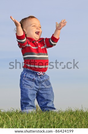 Adorable Baby Standing Up On The Grass Stock Photo 86424199 : Shutterstock