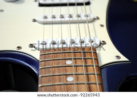 close up of an old style electric guitar
