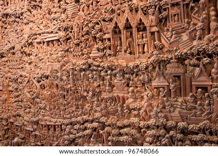 Ancient images carving in Ancient city, thailand Ancient images carved in wood and About traditional Thai culture.
