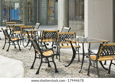 Street scene with chairs and tables in a Chinese city