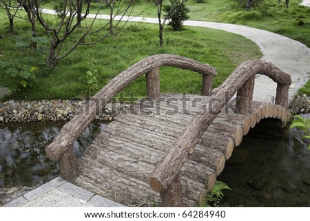 Footbridge and footpath in garden. Prophoto RGB profile used for professional process.
