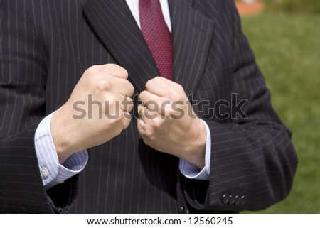 a angry businessman ready to fight (selective and soft focus)