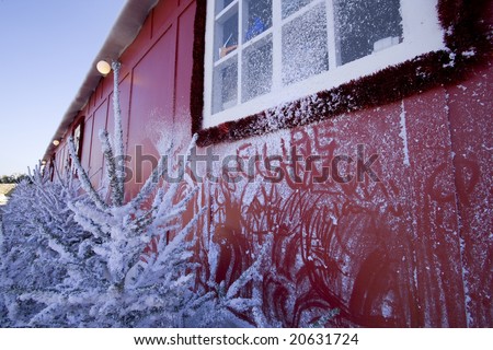 red house cover with white snow