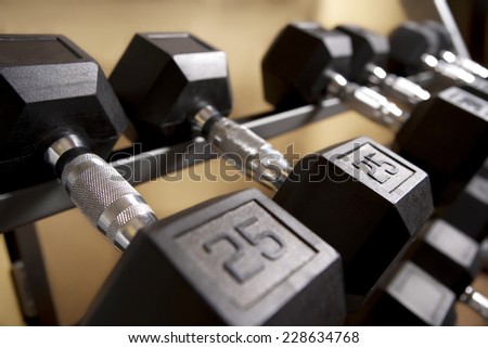 Closeup of Free Weights in Gym