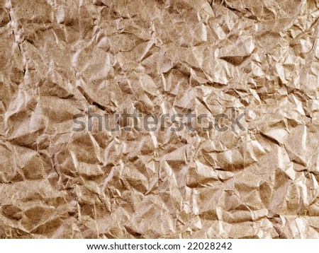 Crumpled brown paper (background).