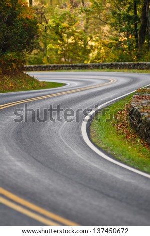 S-curve road on Skyline Drive, tucked into the blue ridge mountains in Shenandoah National Park, Virgina.