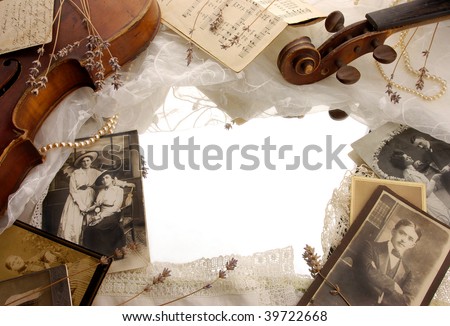Vintage background with photographs and old broken violin