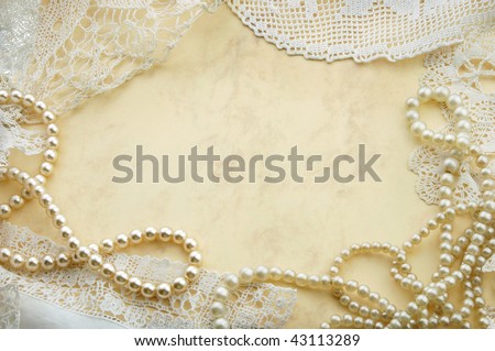 Vintage background with pearls and old doilies
