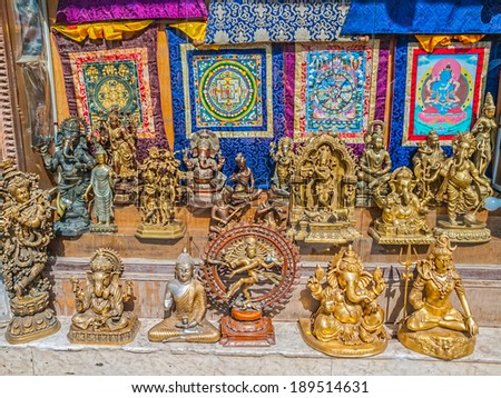 DHARAMSALA, INDIA - MARCH 31, 2010:  Colorful street market with figurines of gods and goddesses.