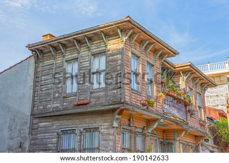 ISTANBUL, TURKEY - SEPTEMBER 27, 2013: The upper floor of an old wooden house, Istanbul street with old traditional wooden houses in Golden Horn district.