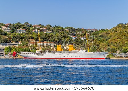 ISTANBUL, TURKEY - SEPTEMBER 29, 2013: Old passenger ship in Bosphorus docked on sunny autumn day in Besiktas district.