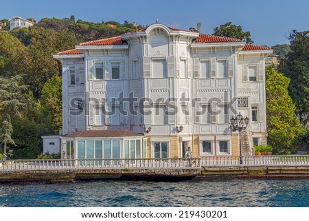 ISTANBUL, TURKEY - SEPTEMBER 29, 2013: View of the first raw of the waterfront house in Kanlica sailing Bosphorus.