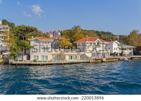ISTANBUL, TURKEY - SEPTEMBER 29, 2013: View of the first raw of the waterfront houses in Kanlica sailing Bosphorus.