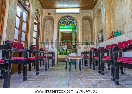 SHIRAZ, IRAN - MAY 2, 2015: Zinat ol Molk House tearoom with chairs it was a private house now turned into a museum.
