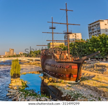 SKOPJE, MACEDONIA - JULY 17, 2015: A large wooden sailing ship stranded on the shores of the river Vardar, turned into a restaurant.