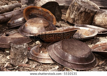 failed, pile of gold pans after everyone has given up